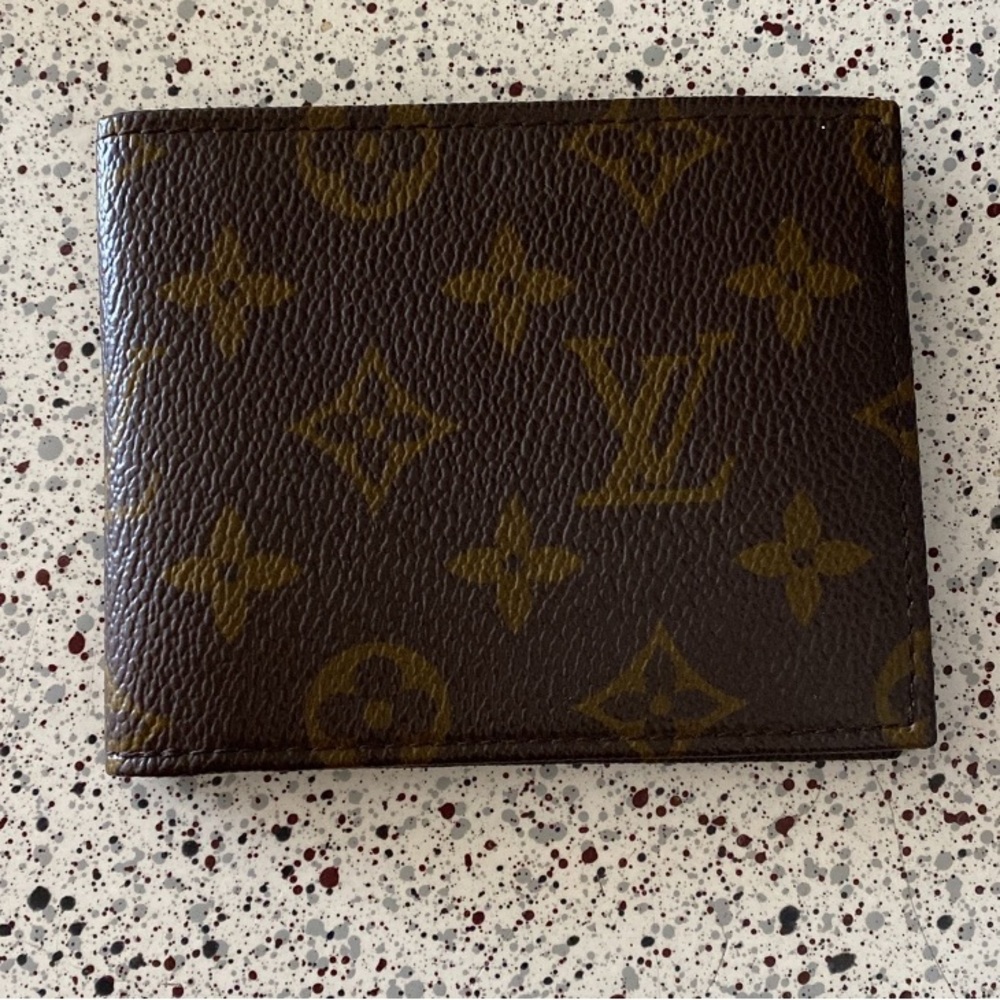 Louis Vuitton wallet brand new sold as is authentic no damages